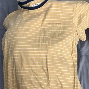 yellow white and blue pocket T